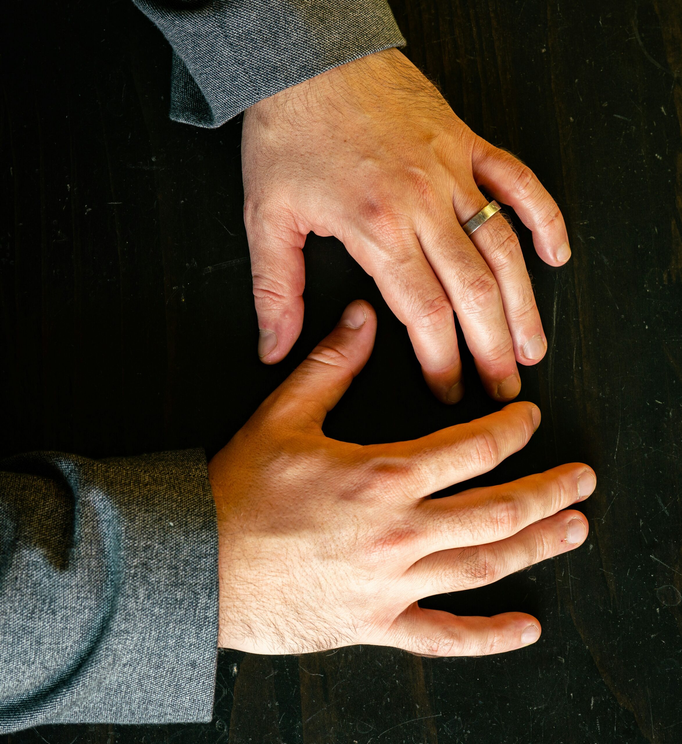 Close-up of hands expressing anxiety, stress, emotional distress, and the need for support.
